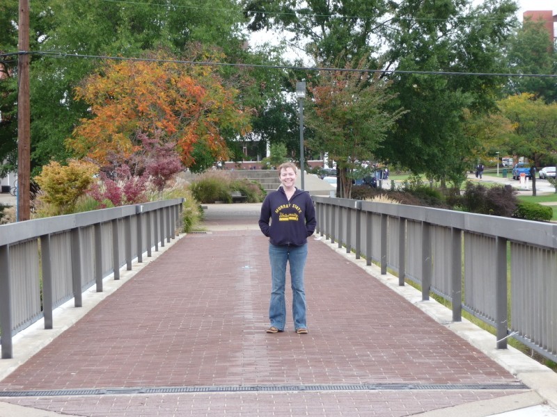 Annie on the bridge to dorms.JPG